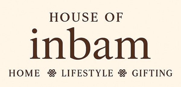 Logo of House of inbam with text on a beige background